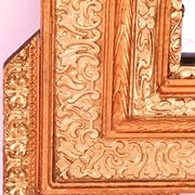 Napoleon III mirror with rich gilded ornamentation