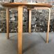 Round dining table in vintage wood