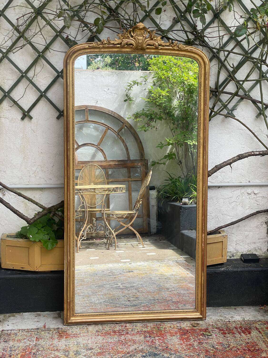 Large mirror gilded with gold leaf (173x85)