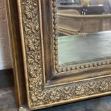Fireplace mirror - varnished wood and gilded stucco with palmette decoration