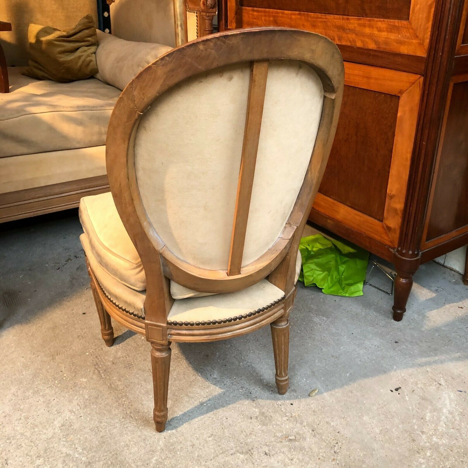 Low chair or medallion-backed heater