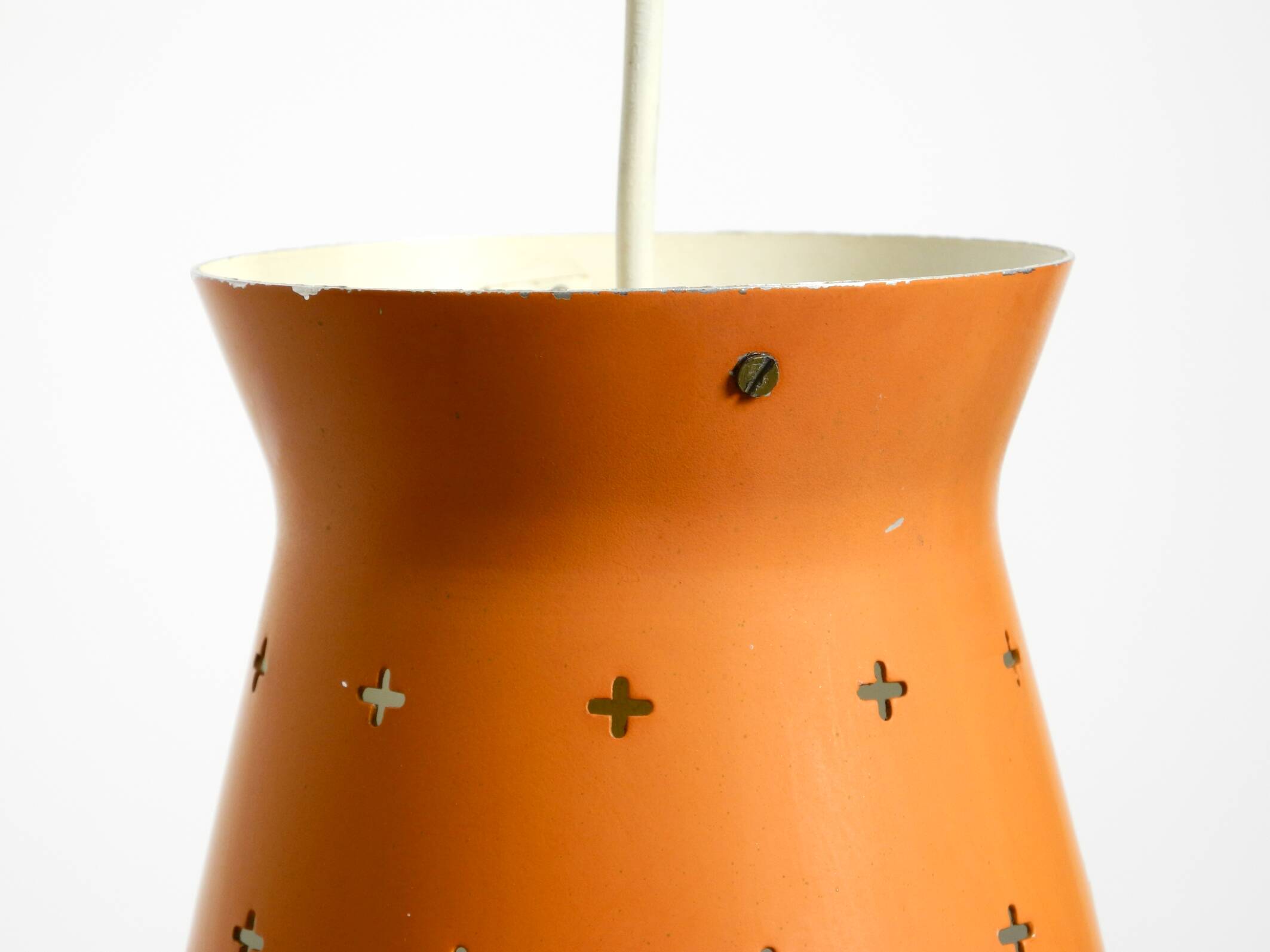Beautiful Mid Century Modern Diabolo perforated metal sheet pendant lamp