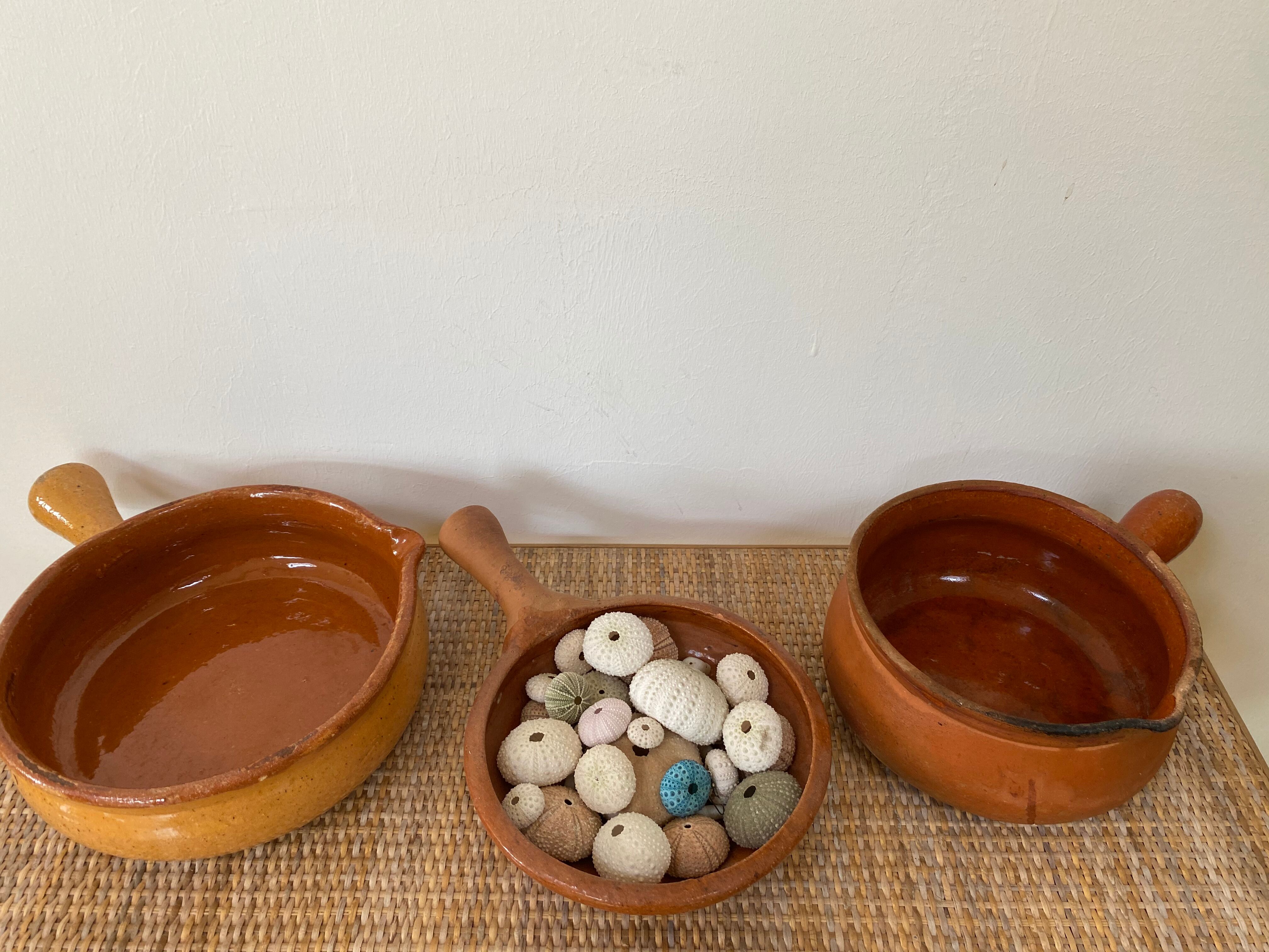 Pair of old pocket pots in glazed stoneware