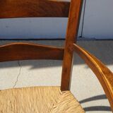 solid wood armchair, straw-covered seat