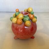 Small tripod vase with multicolored marbles
