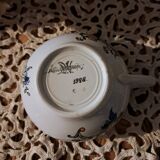 Lunch or chocolate cup with its earthenware saucer from Sarreguemines 1928 cornucopia