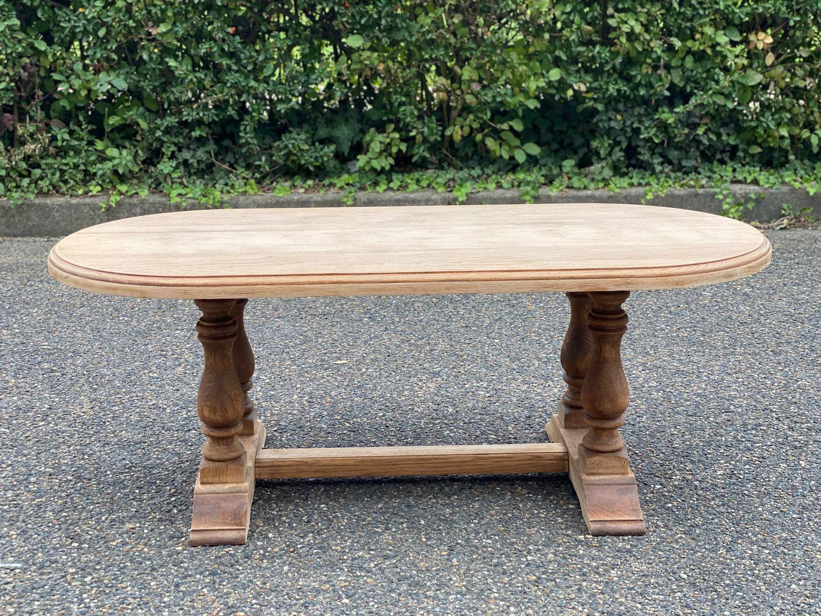 Renovated oval farmhouse or monstera coffee table in raw solid wood