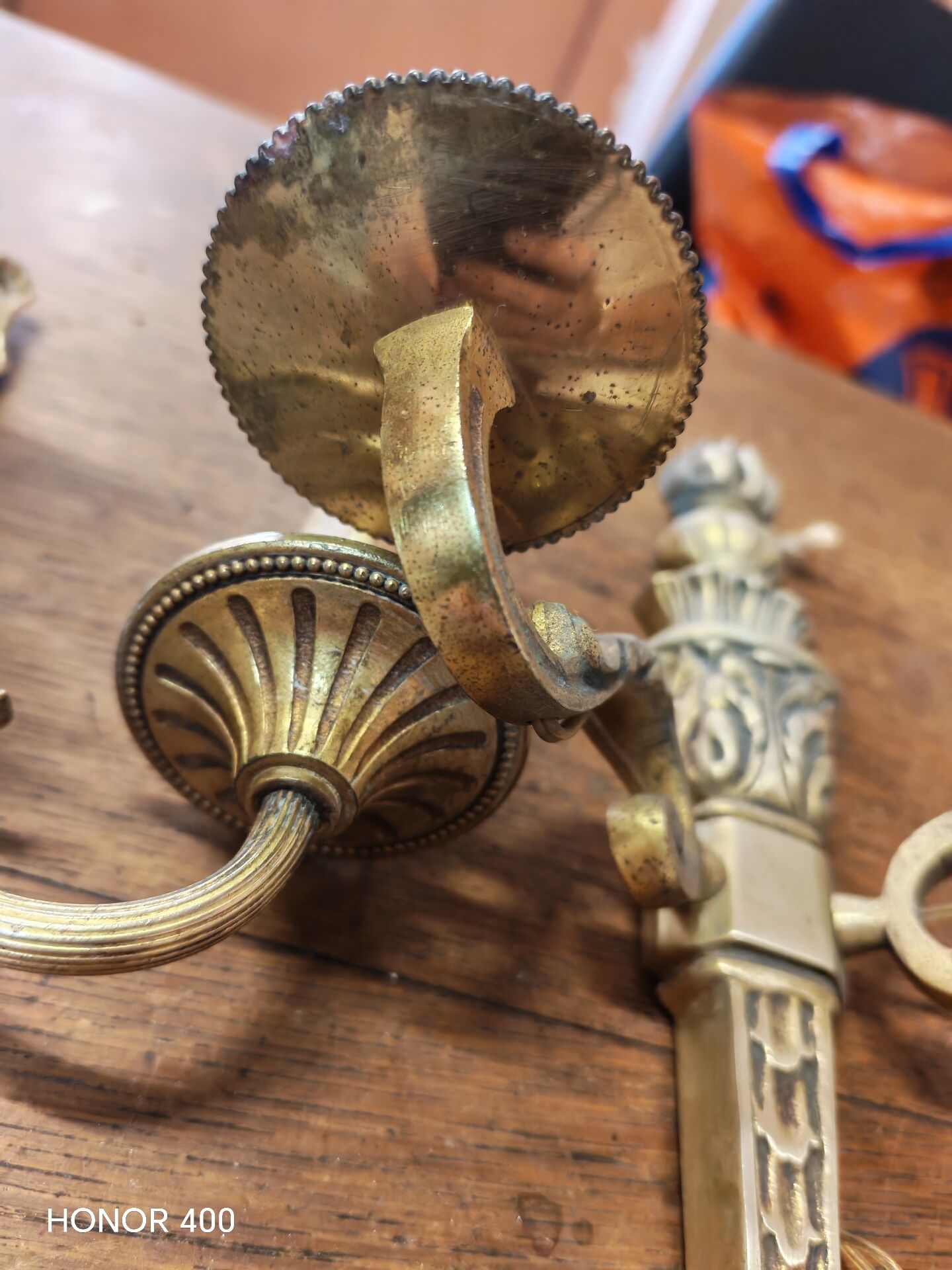 Two antique wall sconces in gilded bronze in the Louis XVI style.
