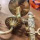 Two antique wall sconces in gilded bronze in the Louis XVI style.
