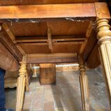 Round drop-leaf table