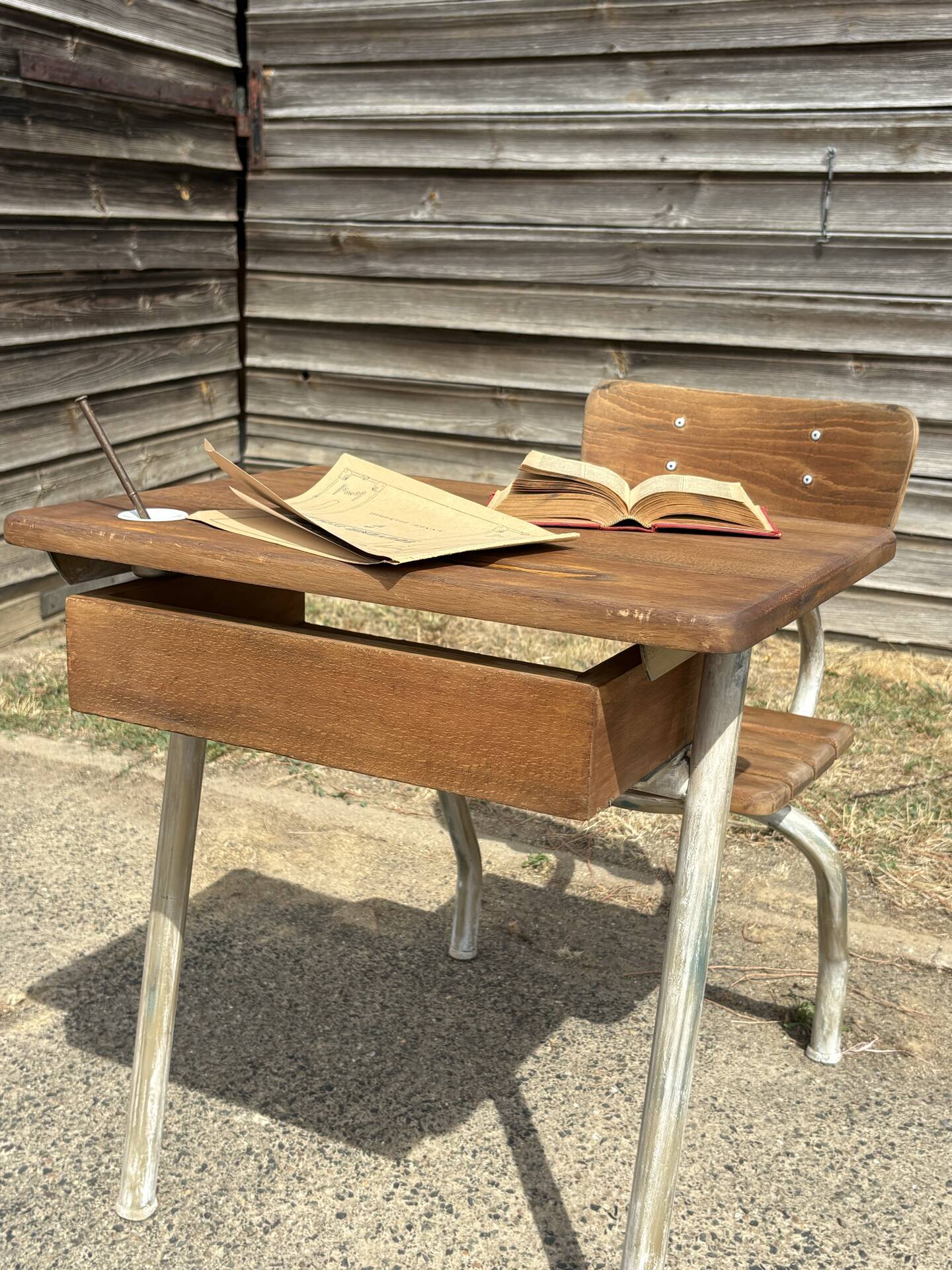Renovated antique desk with inkwell