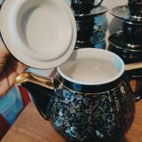 Set of 9 cups and their matching art deco teapot