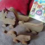 lot de 4 jouets en bois à roulettes