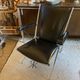 Metal armchair and black skaï