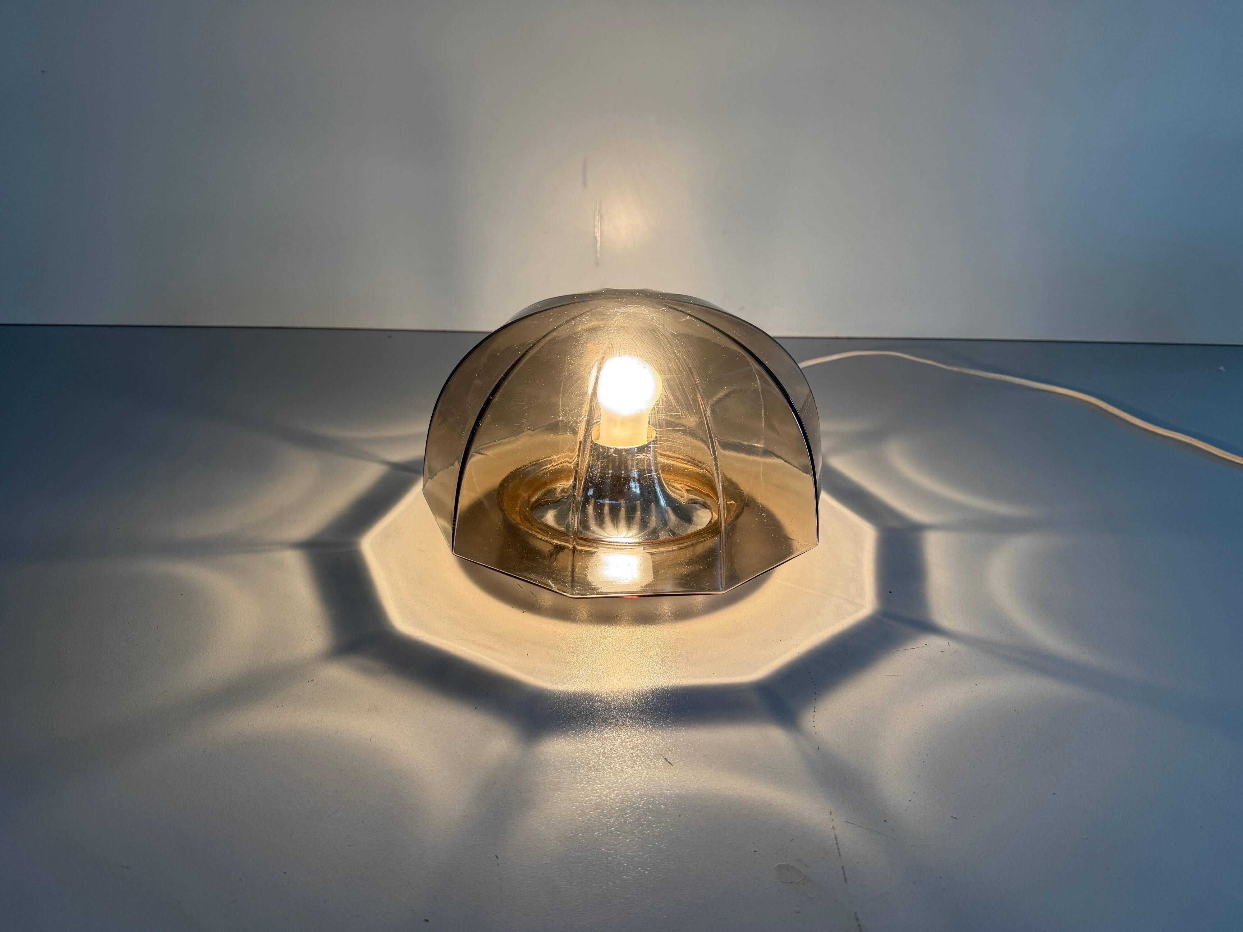Flush-mounted brown glass fixture and metal base by N Leuchten, 1960s, Germany.