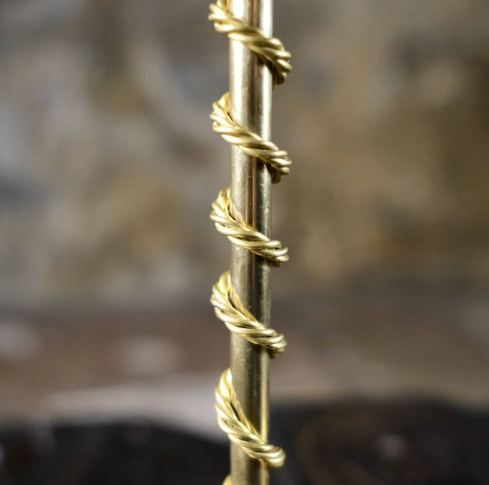 Pair of Art Deco twisted brass candlesticks, France, 1930s
