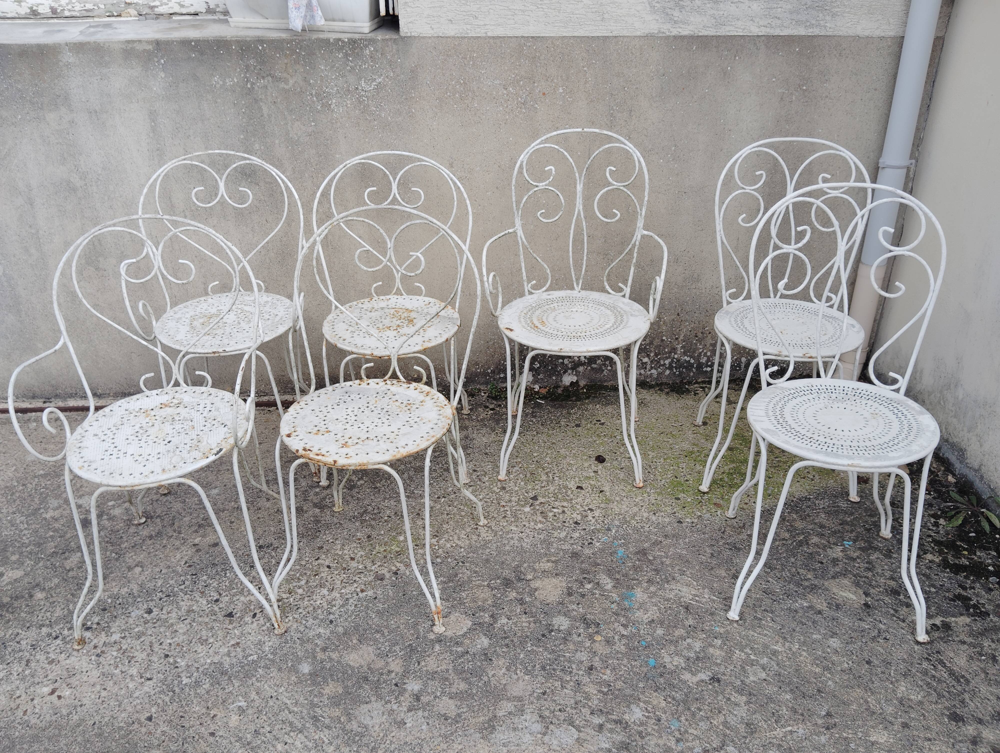 Wrought iron garden furniture from the early 20th century.