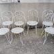 Wrought iron garden furniture from the early 20th century.