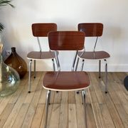 Trio of chairs in light brown formica and cream contour 70s