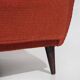 Pair of red armchairs with cone-shaped feet, 1950s