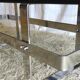 Designer coffee table in chrome metal and smoked glass - 70s/80s