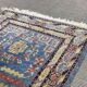 Small handmade wool Iranian rug.
