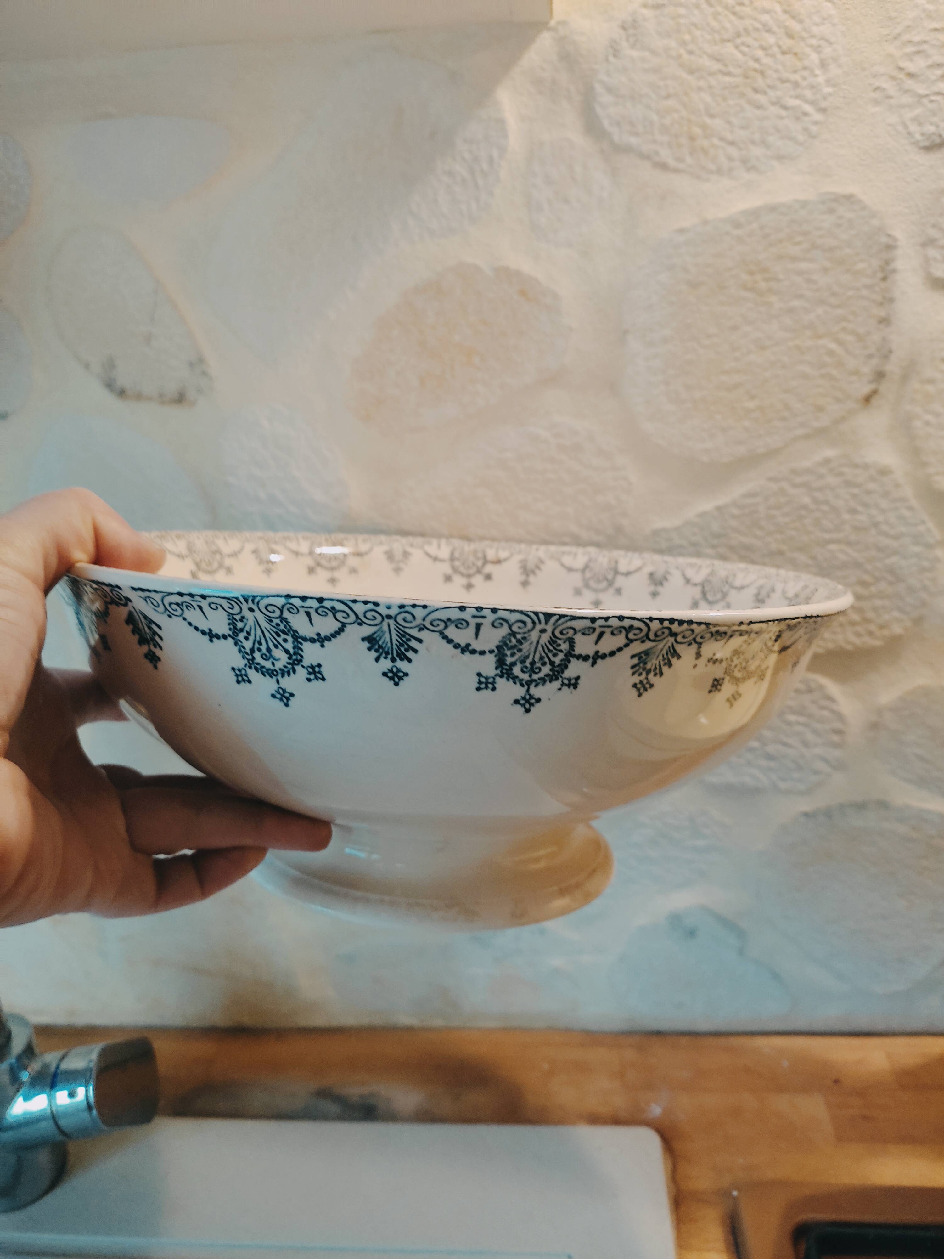 Old bowl in pedestic tiles