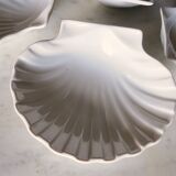 4 antique cups in the shape of a white porcelain shell