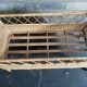 Braided rattan cot