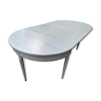 Extendable half-moon table