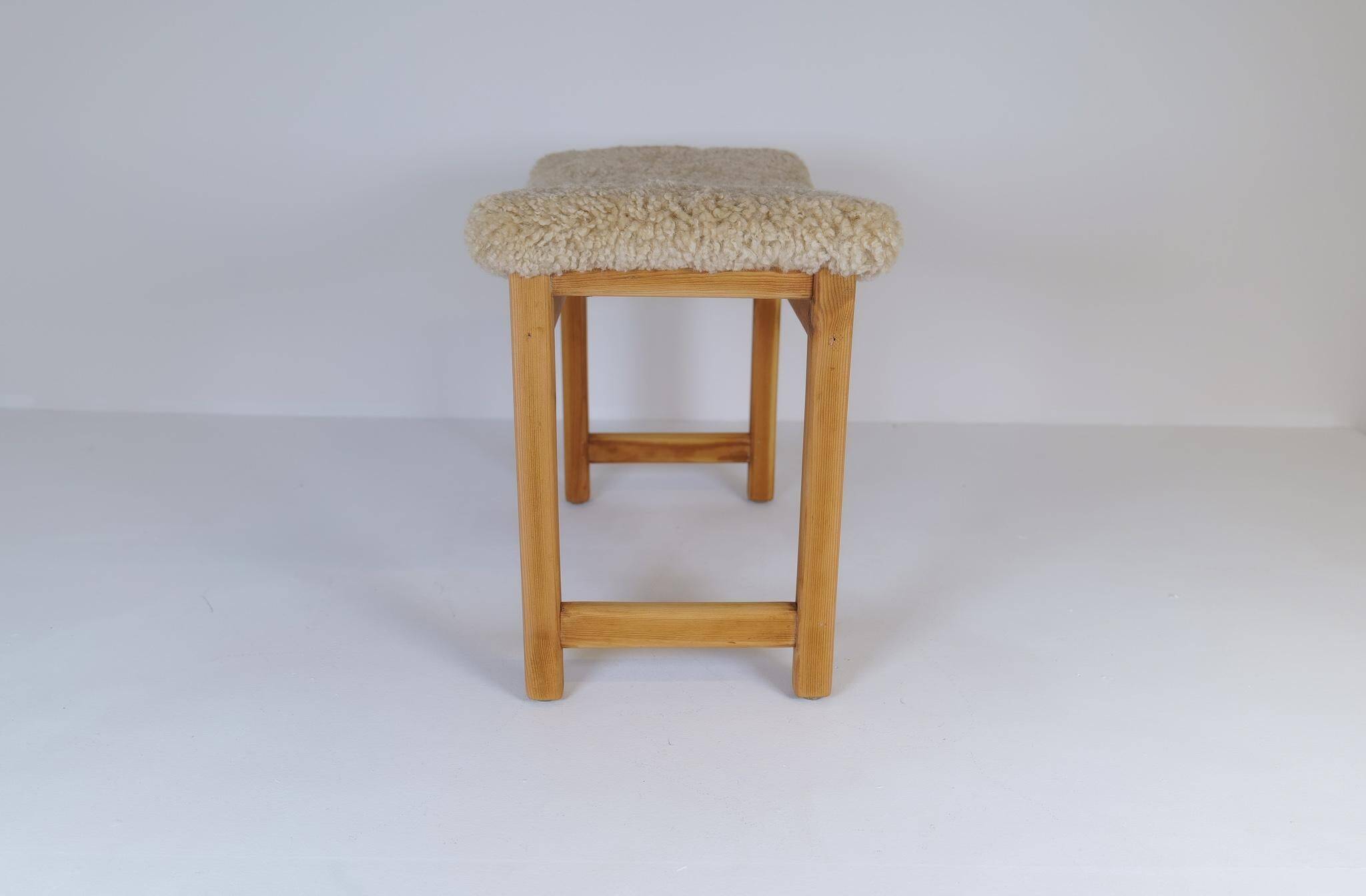Modern Scandinavian stool in pine and sheepskin, Sweden, 1970s