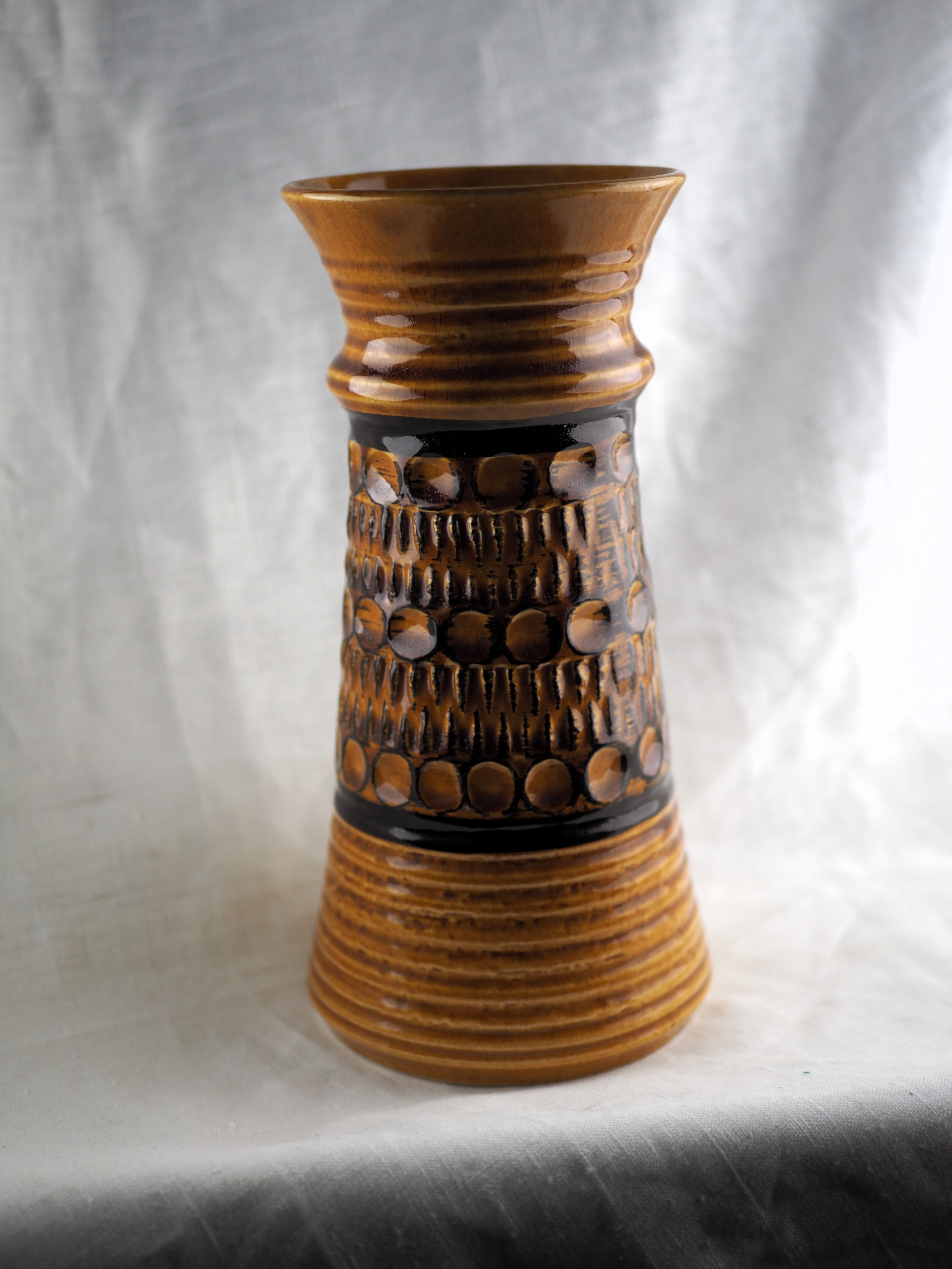 High arched vase, round hollow patterns and spikes, black and ocher seventies vibe - Bay Keramik - 70'