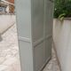 Renovated Art Deco display cabinet in grey-green.