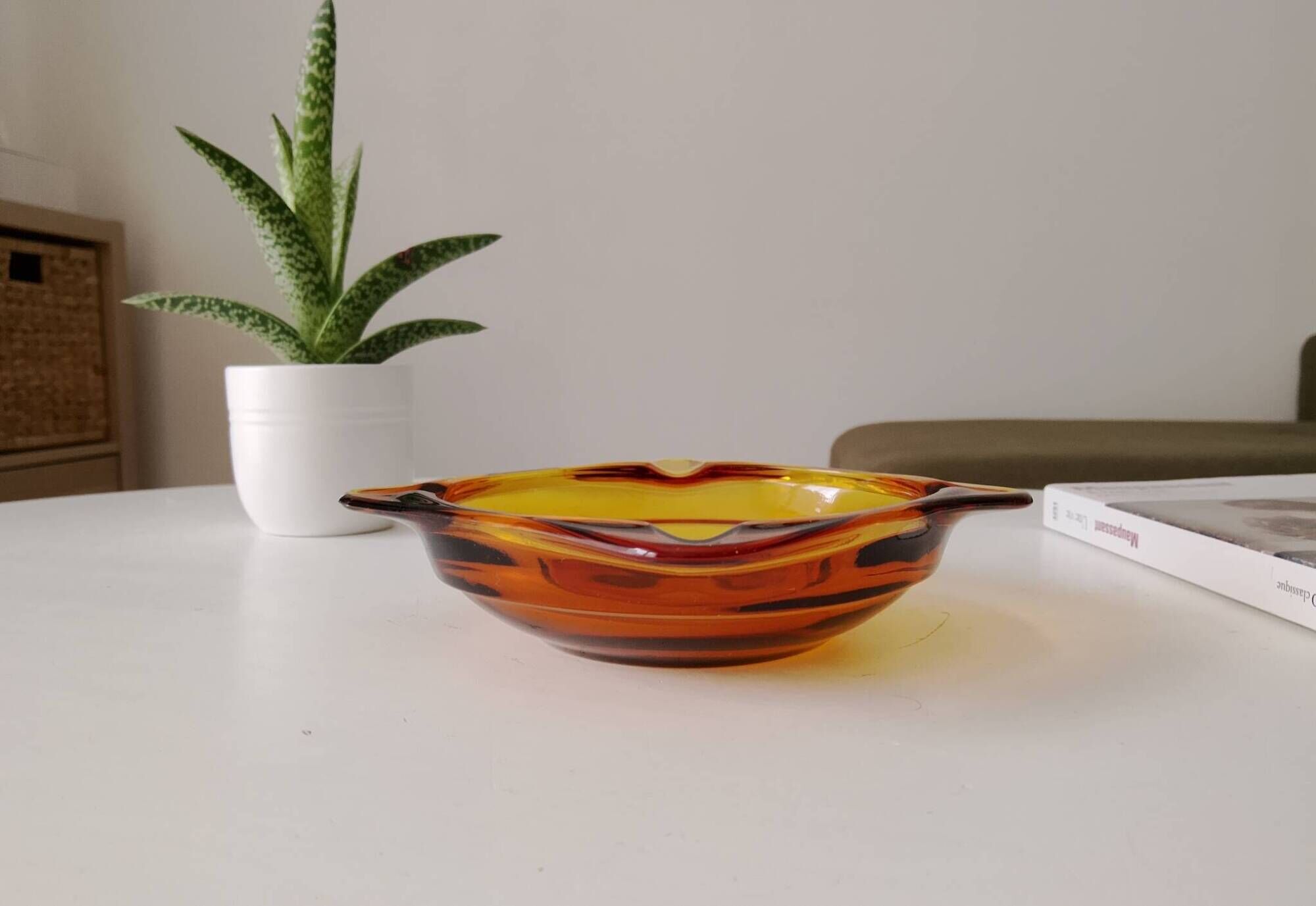 Vintage amber Duralex ashtray from the 1970s.