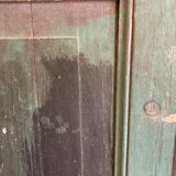 Old glazed wooden door patinated