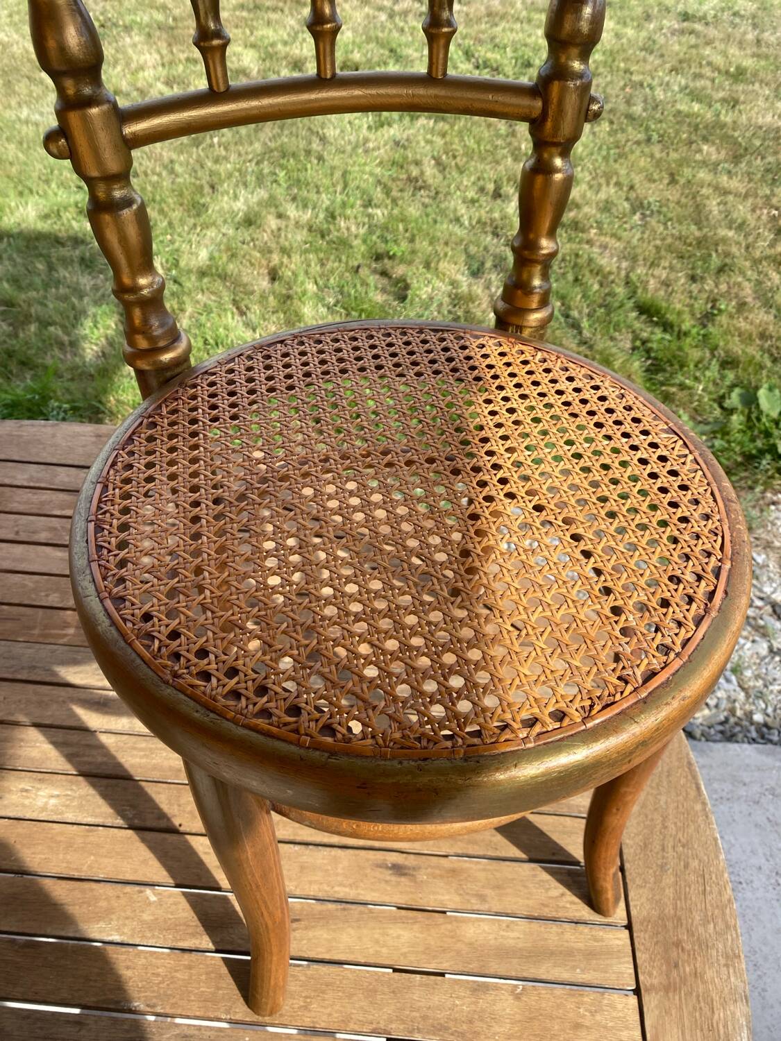 Children's chair in cane and curved wood