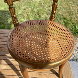 Children's chair in cane and curved wood