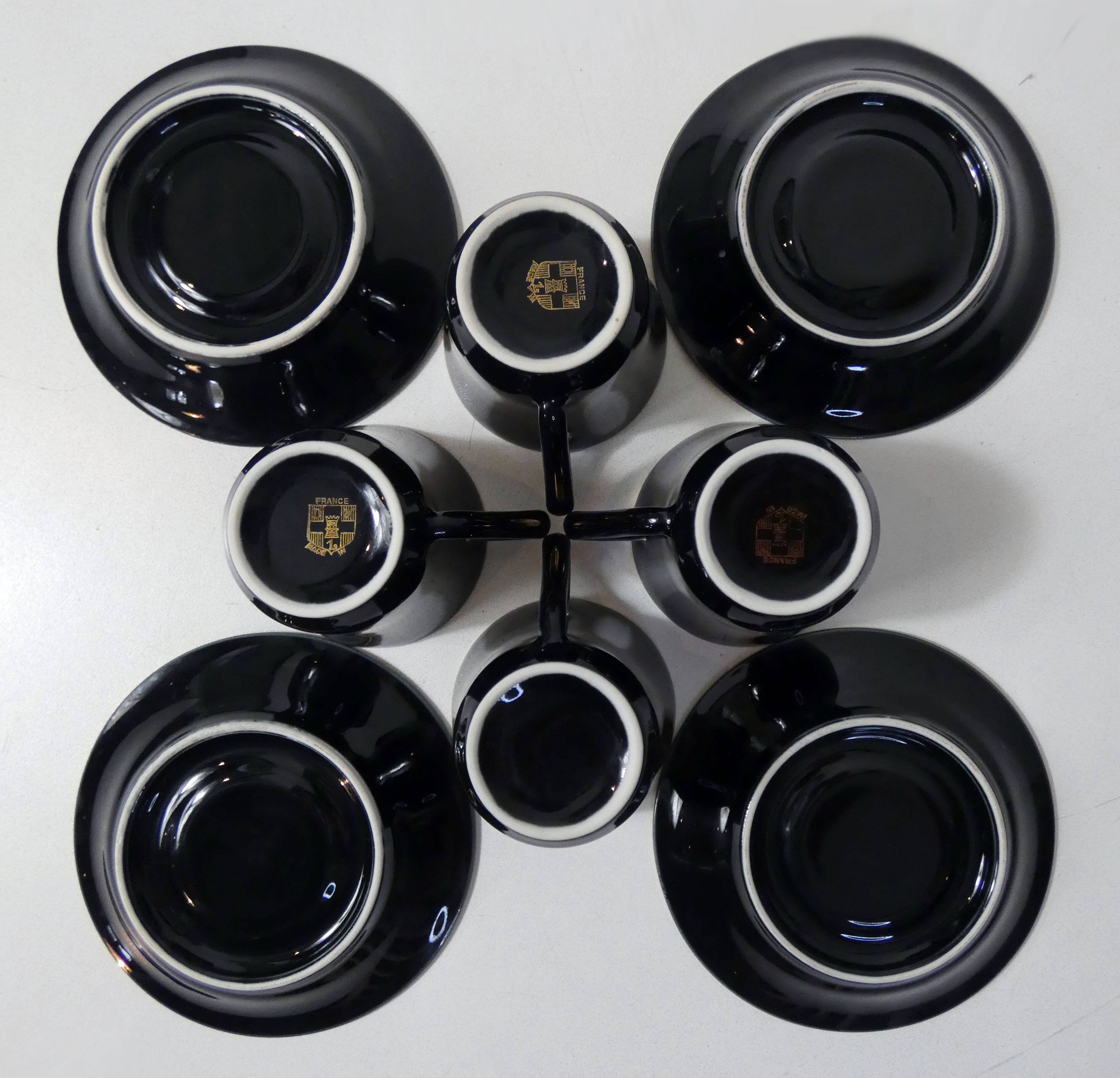4 old black and gold cups in Vintage color