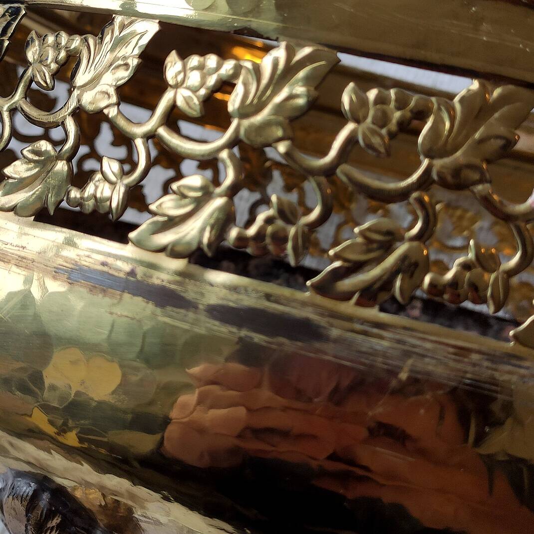 Old golden metal planter