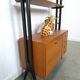 Armoire design en teck Musterring avec pieds noirs