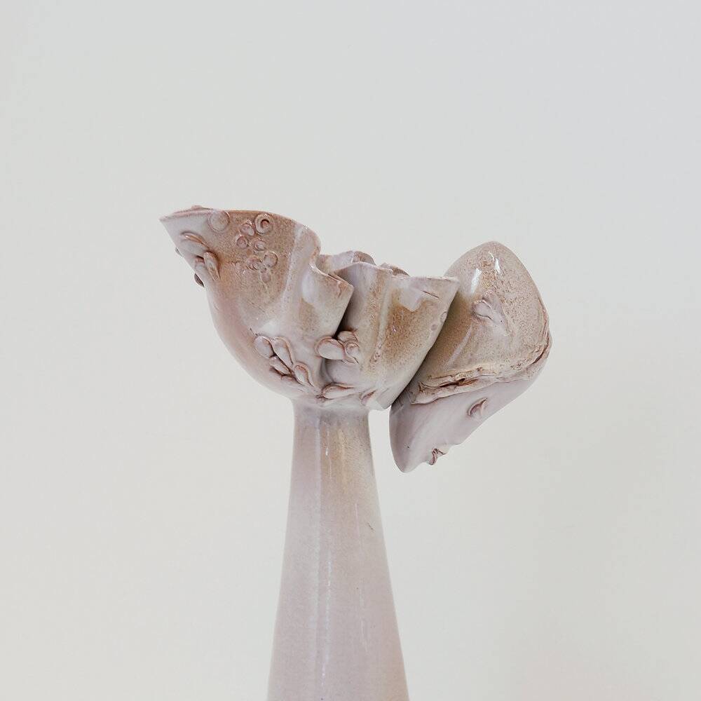 Ceramic sculpture of a female face - flower vase decoration