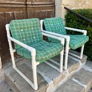 Pair of vintage tubular armchairs from the 70s and 80s, luxury design.