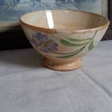Old bowl in earthenware with floral decoration.