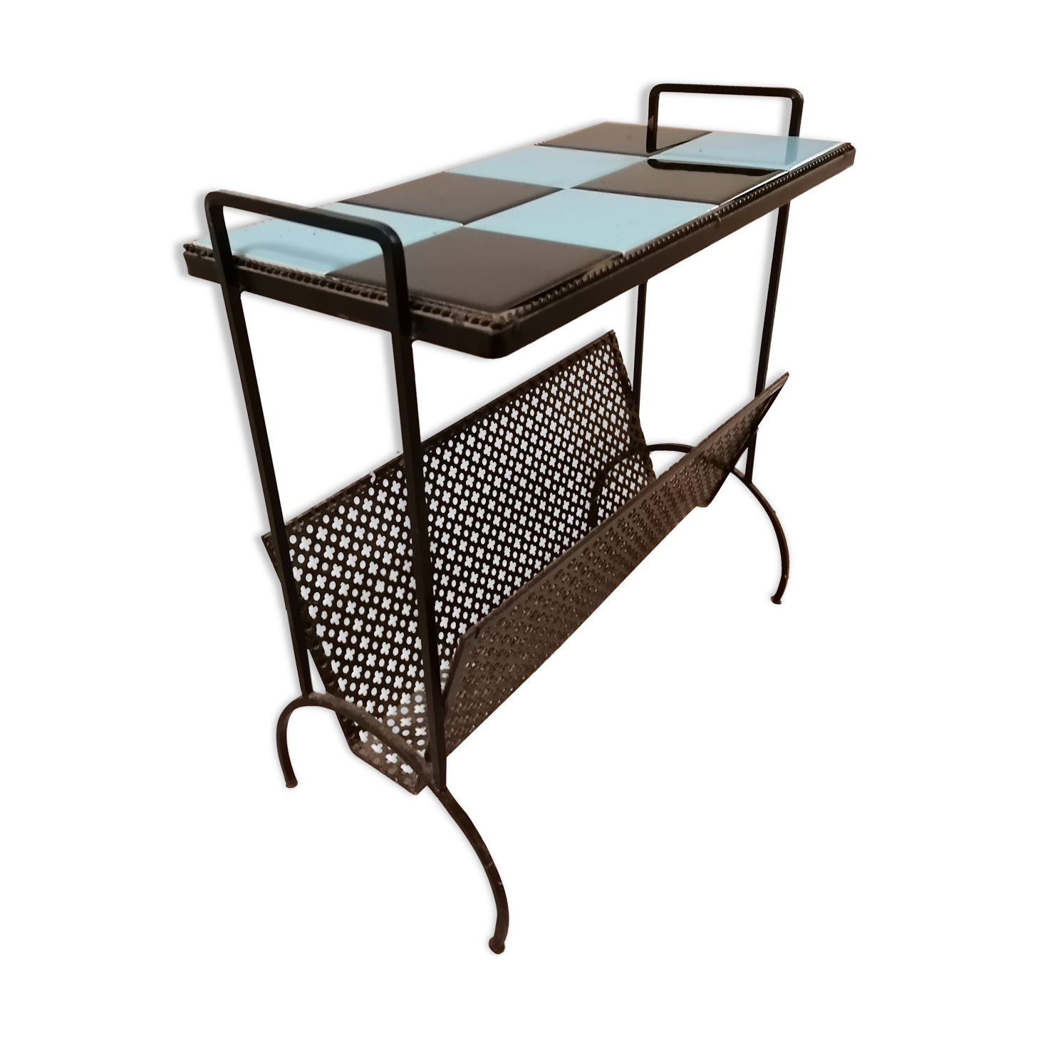 Table carries steel magazines perforated sheet metal vintage ceramic checkerboard