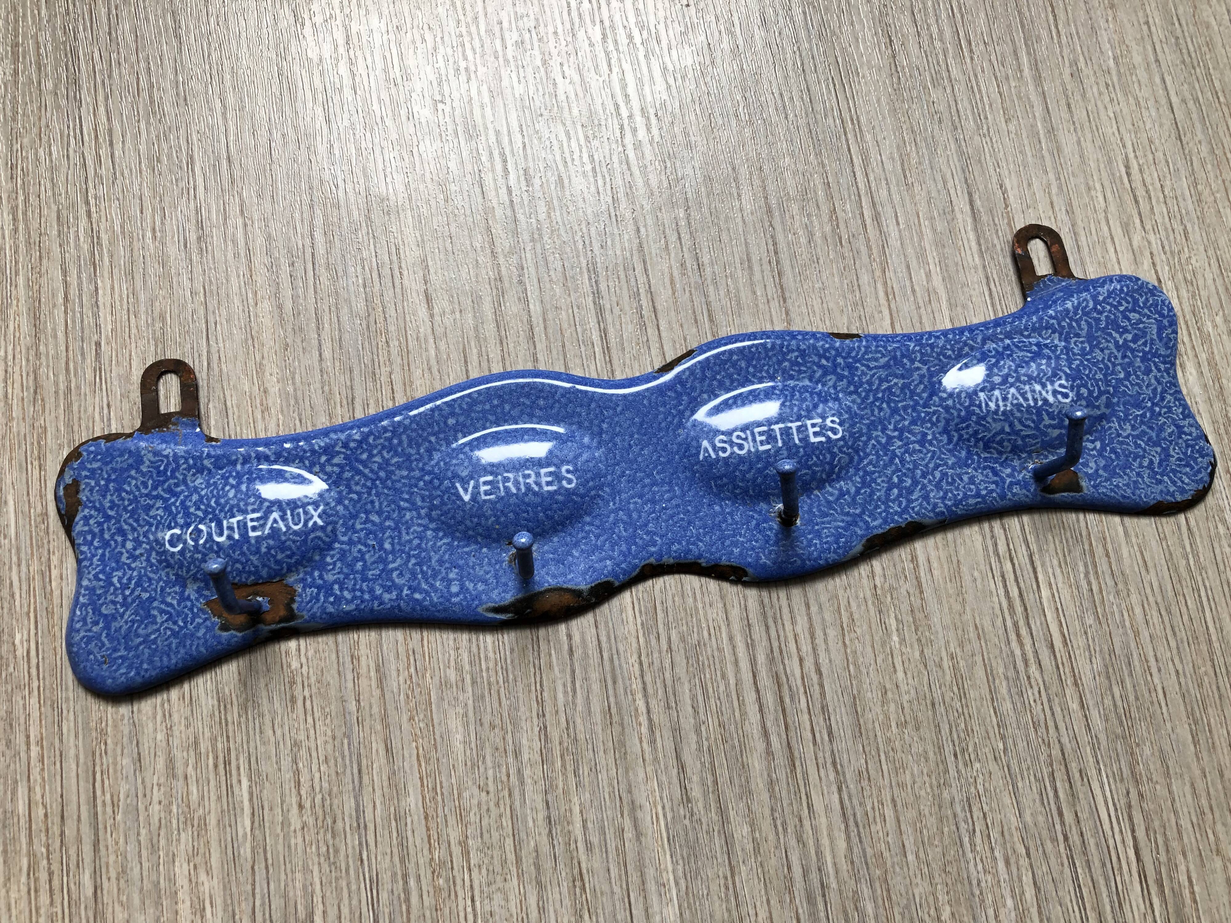 Old enamelled tea towel door