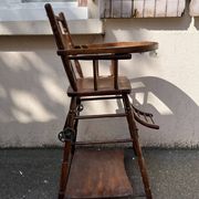 Wooden baby high chair convertible into a small desk from the 1950s