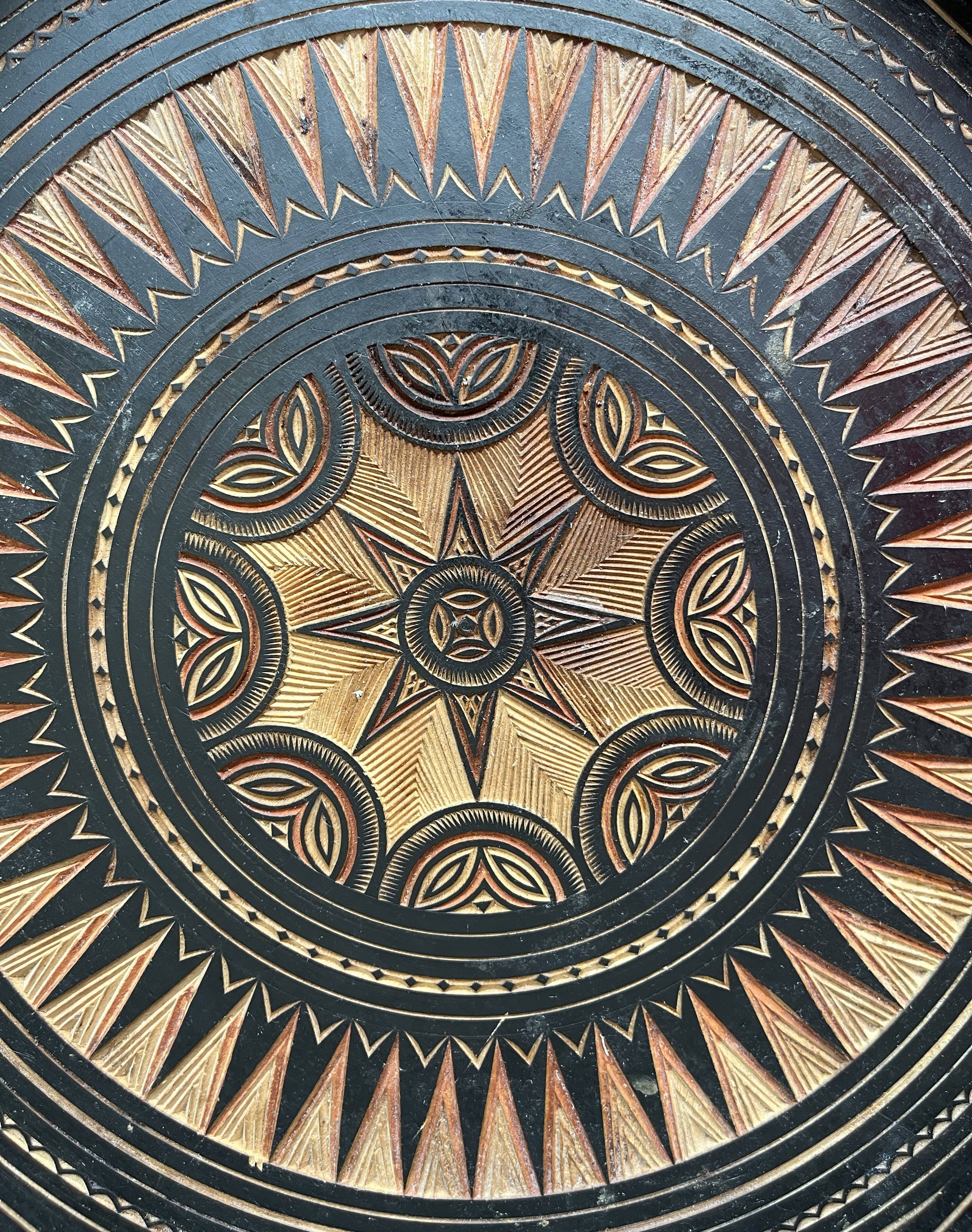 Octagonal carved wooden top