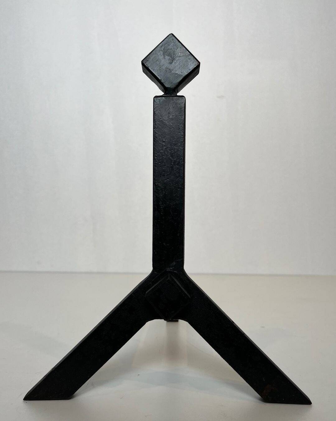 Pair of Modernist Black Iron Andirons with Diamond Finials and Angled Bases