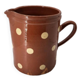 Old pitcher with polka dots savoyard pottery in glazed terracotta alsace