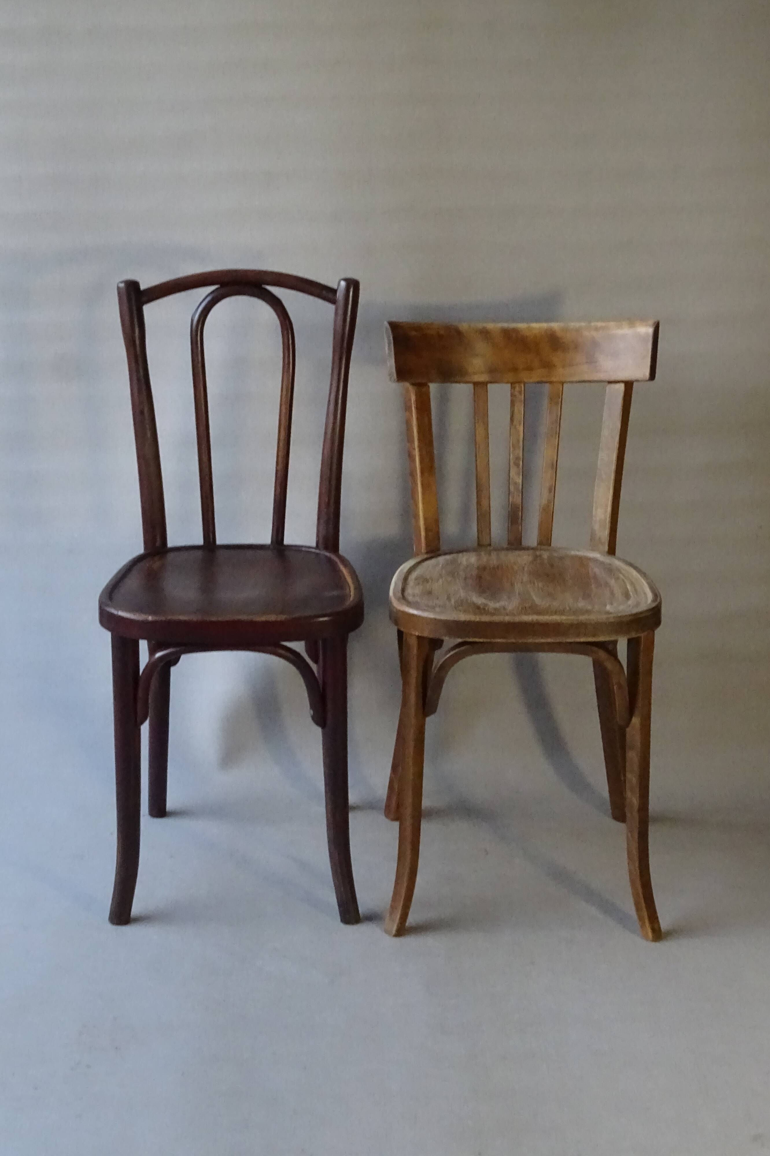 Set of 36 mismatched Bistrot chairs, 1920 to 1950, wooden seats.